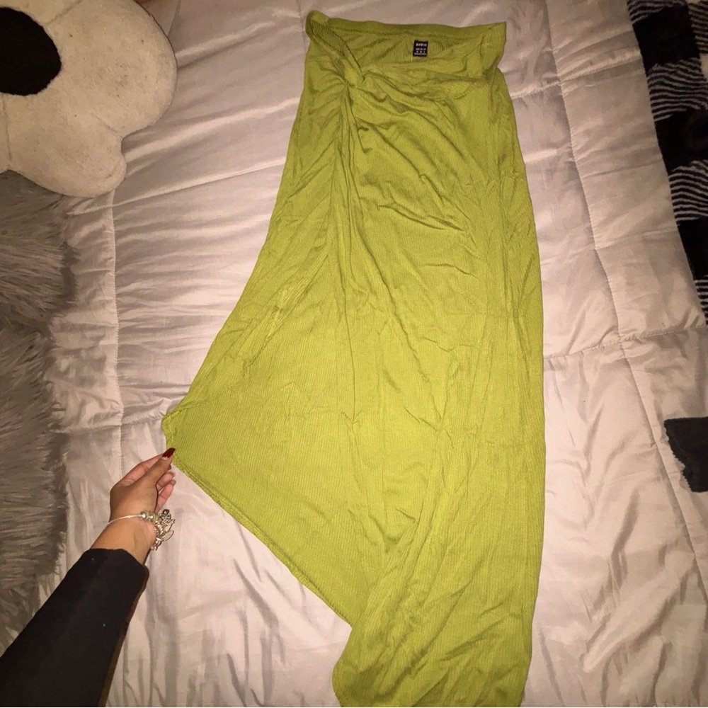 long green skirt with slit and knot